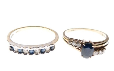 Two 9ct gold rings, the first set central faceted...