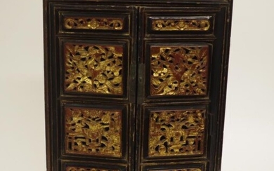 Vintage Chinese decorated tabletop cabinet with gilded carved wood...