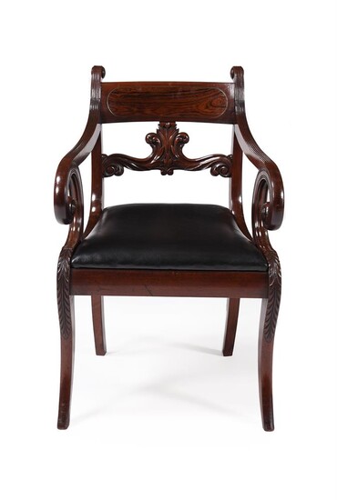 Y A GEORGE IV MAHOGANY AND ROSEWOOD LIBRARY OPEN ARMCHAIR, IN THE MANNER OF GILLOWS, CIRCA 1825