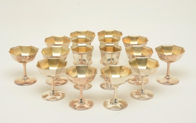12 Gorham sterling silver champagnes and 4 goblets