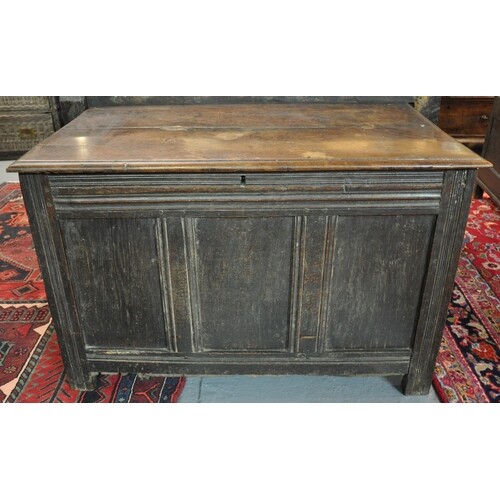 18th century oak coffer, the hinged moulded top above three ...