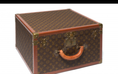 LOUIS VUITTON Monogram canvas rigid suitcase and cowhide profiles,...
