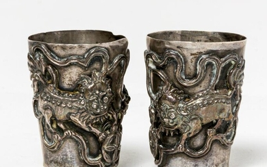 2 CHINESE SILVER LIONS BEAKERS, probably around