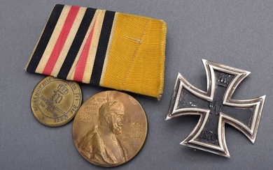 2 Various parts: Iron Cross 1st Class 1870, silver/iron blackened, maker's inscription "G" on reverse (4.5x4.5cm, slightly rest., slightly defective) and medal clasp with 2 medals: Kaiser Wilhelm I. commemorative medal 1897/war memorial coin for...