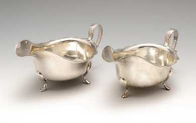 A pair of 1930's silver sauce boats, each of typical