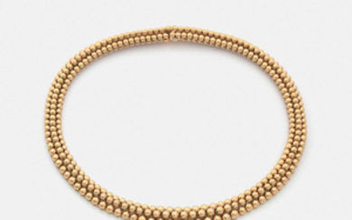 BOUCHERON "GRAINS DE RAISIN" NECKLACE A gold necklace....