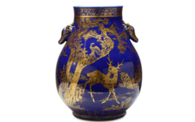A CHINESE GILT-DECORATED POWDER BLUE VASE. Qing Dynasty,...