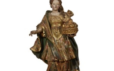 A Continental polychromed and parcel-gilt figure of Ceres late...