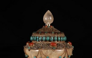 A CRYSTAL BOX INLAID WITH STONES