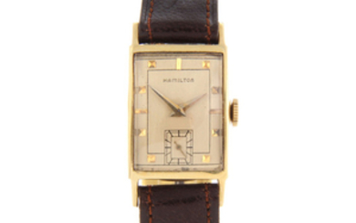 HAMILTON - a gentleman's yellow metal wrist watch with two Hamilton watches.