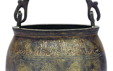 A KHORASSAN COPPER-INLAID BRONZE BUCKET, NORTH EAST IRAN, 12TH CENTURY
