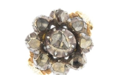 A late Georgian silver and gold diamond ring. The