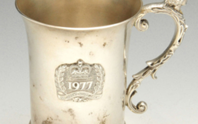 A modern silver mug commemorating The Queen's Silver Jubilee.