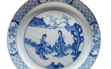 ASSIETTE RONDE en porcelaine à décor bleu…