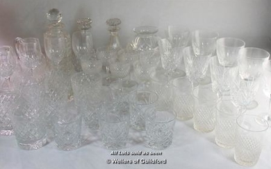 A quantity of glassware to include stem ware and tumblers, two water jugs, baluster vase, pair of small ship's decanters...