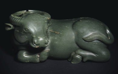 A RARE LARGE SPINACH-GREEN JADE FIGURE OF A RECUMBENT BUFFALO, CHINA, QING DYNASTY, 18TH CENTURY