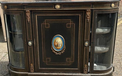 A 19th cent ebonised Credenza with Gilt ormolu mounted Sevres...