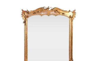 A 19th century giltwood overmantel mirror, the shaped top wi...