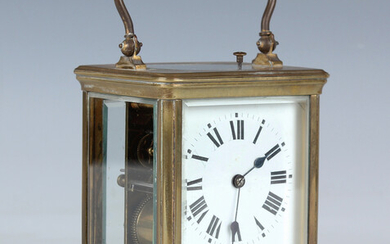 A 19th century/early 20th century French brass cased carriage clock with eight day movement striking