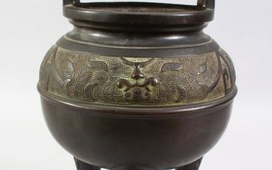 A 20TH CENTURY CHINESE BRONZE TWIN HANDLE CENSER, with