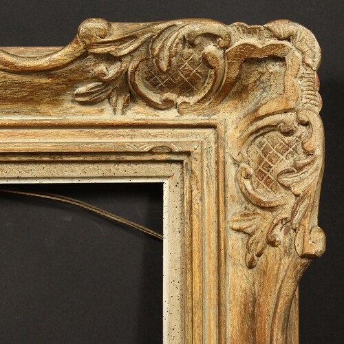 A 20th Century carved frame, rebate size - 14.5" x 9.5" (37 ...