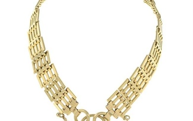 A 9ct gold gate-link bracelet, gathered at a heart-shape padlock clasp.