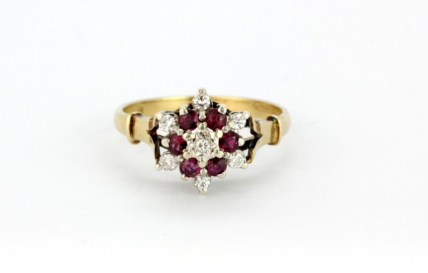 A 9ct yellow gold ruby and diamond set cluster ring, (R).