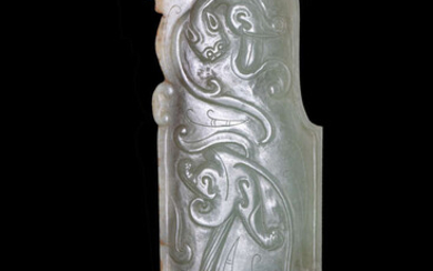 A CELADON AND RUSSET JADE ARCHAISTIC BLADE China,...