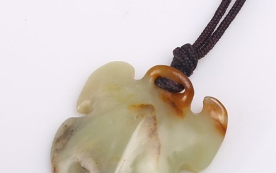 A CHINESE JADE CARVED TURTLE PENDANT