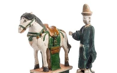 A CHINESE SANCAI GLAZED POTTERY HORSE AND A GROOM