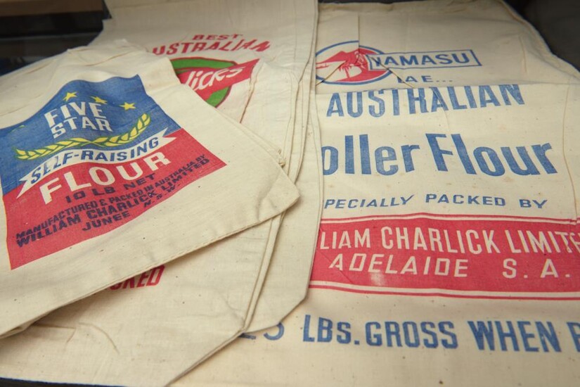 A COLLECTION OF VINTAGE AUSTRALIAN SCREEN PRINTED CLOTH FLOUR SEED SACKS, LEONARD JOEL LOCAL DELIVERY SIZE: SMALL
