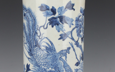 A Chinese blue and white porcelain cylinder vase, late 19th century, painted with a pair of fenghuan