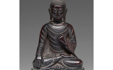 A Chinese bronze figure of Shakyamuni Buddha, 18th c or late...