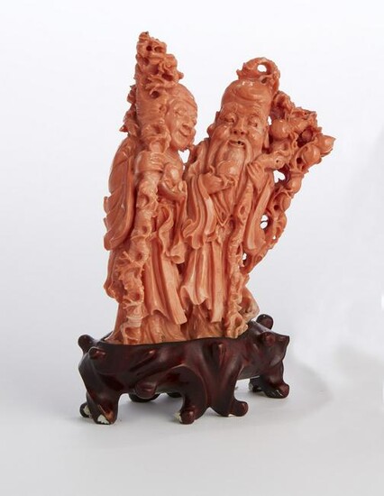 A Chinese coral figural group of Shou Lao