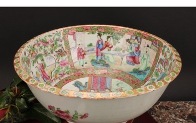 A Chinese famille rose bowl, painted in the typical Cantones...