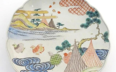 A Chinese plate with a lobed rim, decorated with a