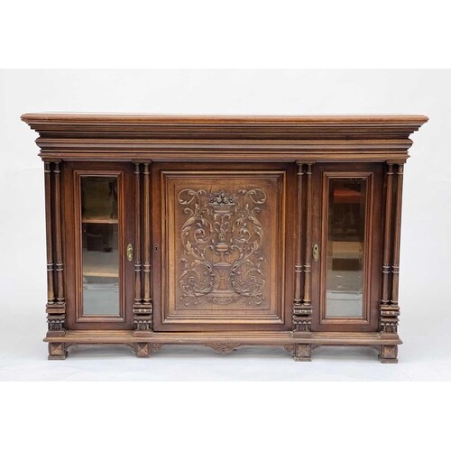 A Continental walnut credenza, 19th century, with central ca...