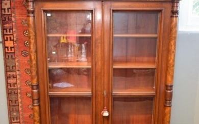 A DECORATIVE CARVED GLASS FRONTED BOOKCASE (A/F) (206H x 131W x 48D CM) (PLEASE NOTE THIS HEAVY ITEM MUST BE REMOVED BY CARRIERS AT...