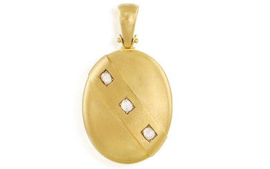 A DIAMOND AND GOLD PENDANT LOCKET The ovals-shaped...