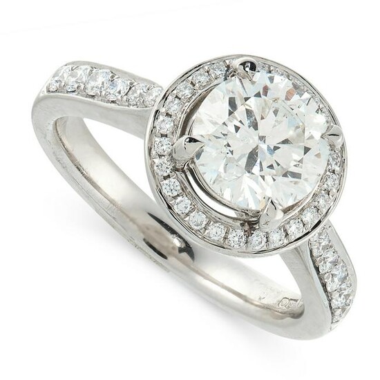 A DIAMOND CLUSTER RING in platinum, set with a round