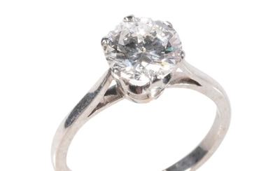 "A DIAMOND SOLITAIRE RING with "World Gemological Institute"...
