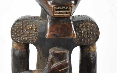 A Fang reliquary figure, Gabon, applied with brass detail, height...