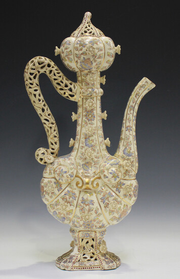 A Fischer Budapest pottery ewer, early 20th century, the flattened, lobed body painted and gilt with