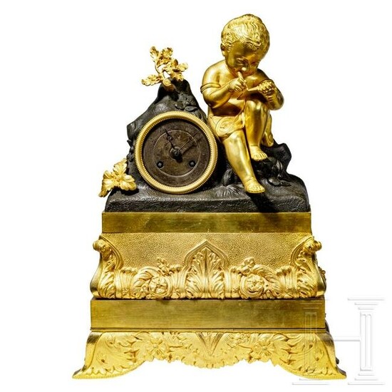 A French Empire ormolu and brass mantle clock, circa