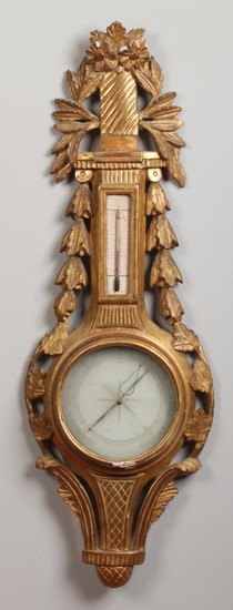 A French Louis XVI giltwood and gesso mercury wall barometer...