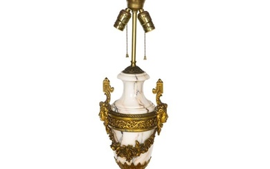 A French Neoclassical style gilt bronze mounted variegated white marble table lamp