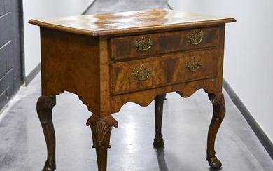 A George II figured walnut dressing table, mid 18th