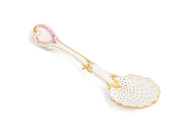 A German porcelain rococo pierced sugar spoon, possibly Fürstenberg