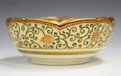 A Japanese Satsuma earthenware circular bowl with scalloped rim, Meiji period, painted to the interi