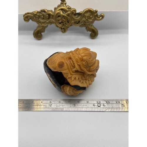 A Japanese hand carved Tagua nut sculpture. Designed in the ...